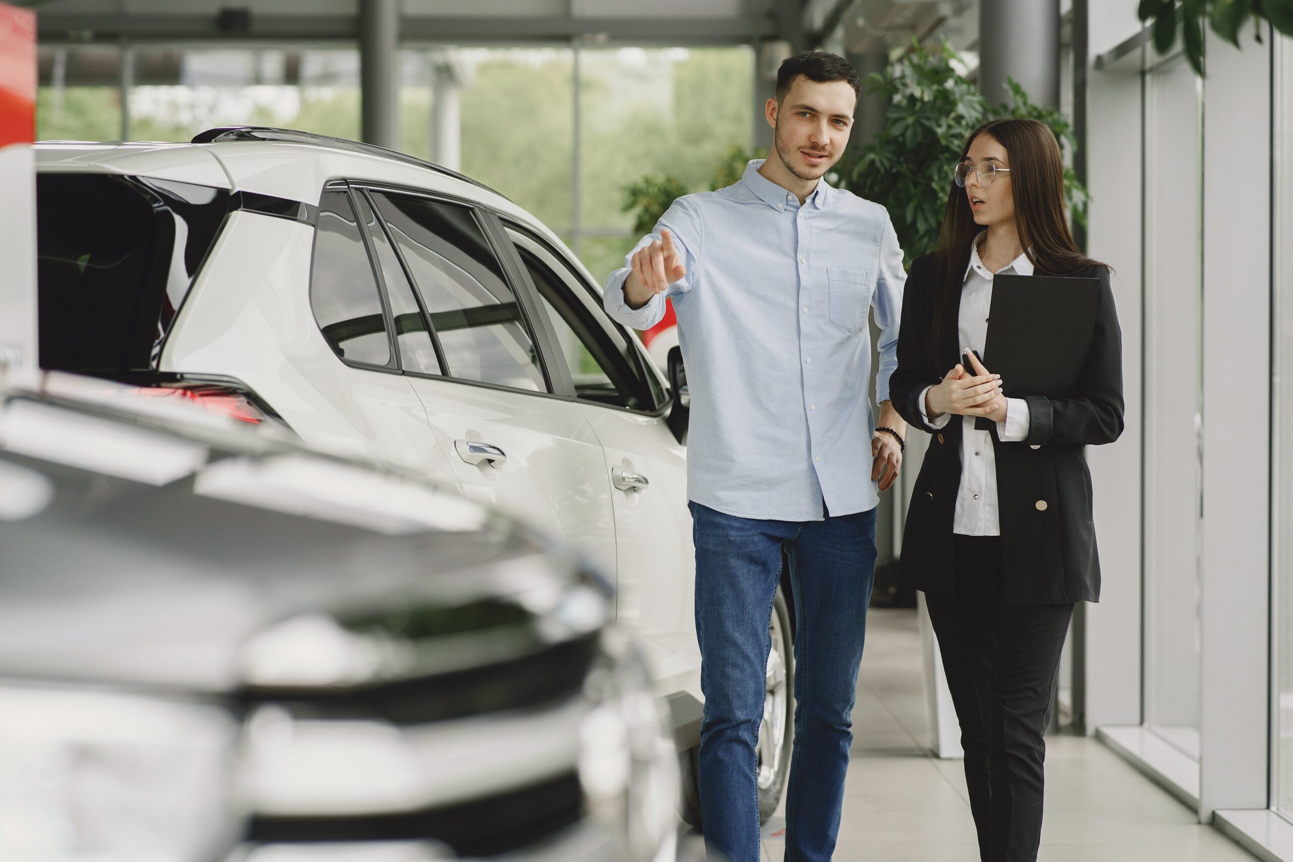 A distracted car lot owner wishes they had an auto dealer floorplan to give them more time for customers.