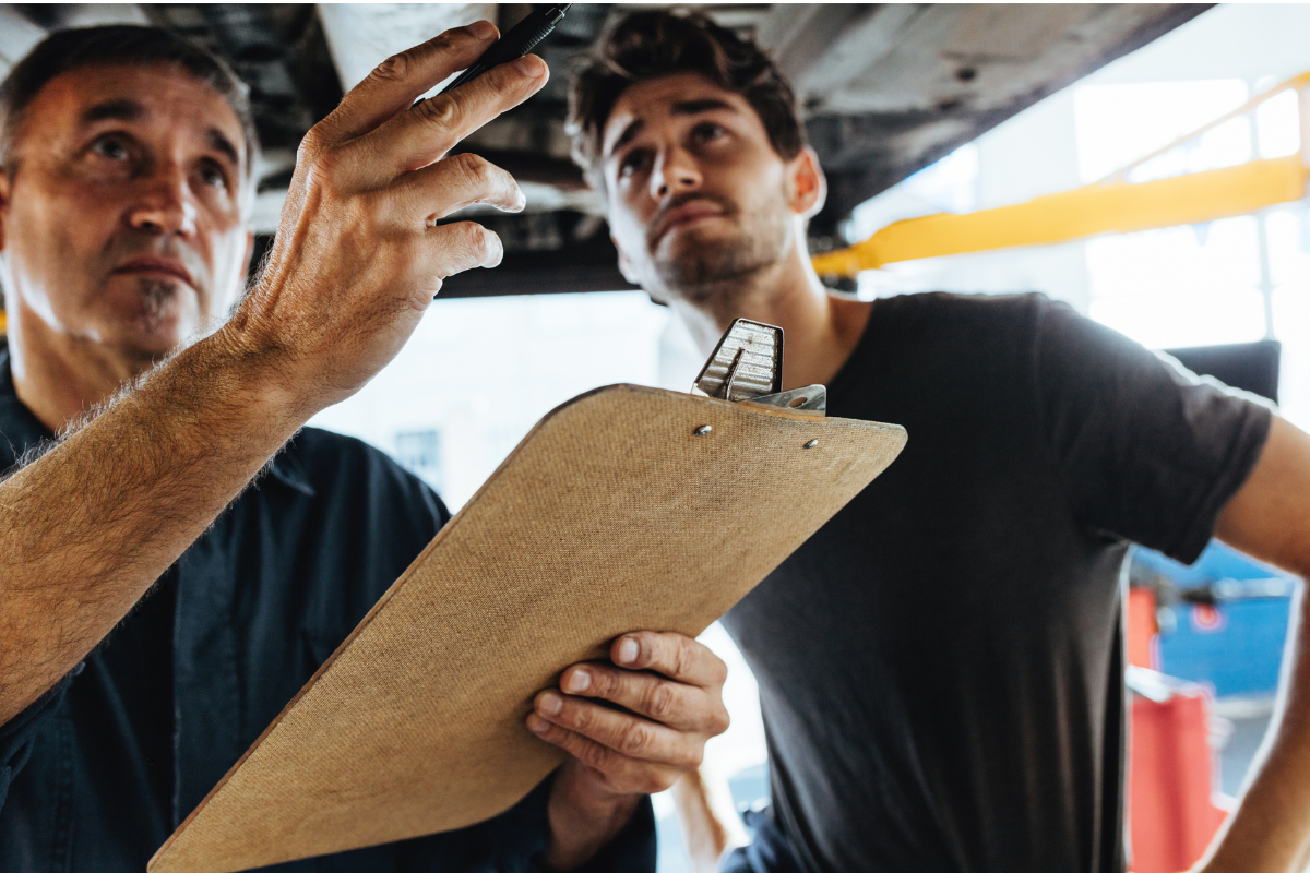 Mechanic works on vehicle condition report